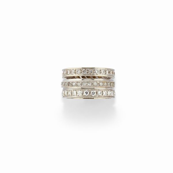 Tre anelli eternity in oro bianco 18K, diamanti e pietre sintetiche  - Asta Argenti - Associazione Nazionale - Case d'Asta italiane