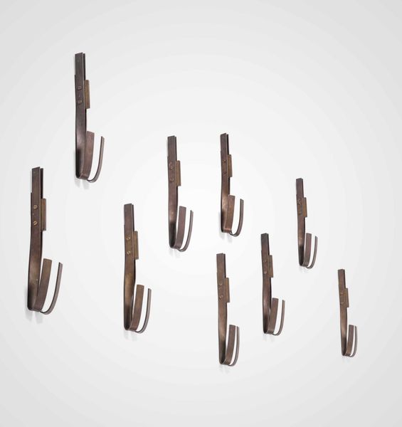 Set di nove appendiabiti a parete  - Asta Design - Associazione Nazionale - Case d'Asta italiane