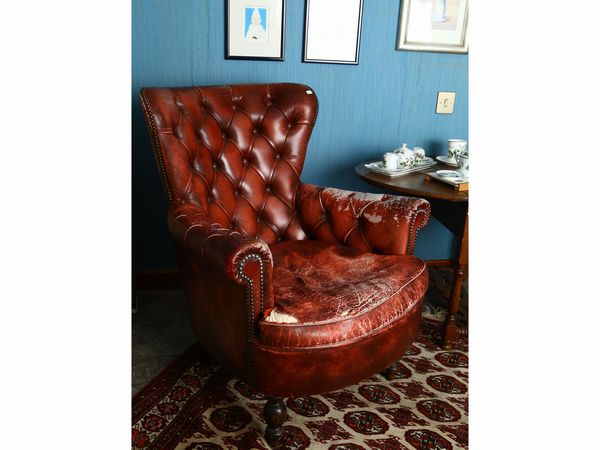 Poltrona rivestita in cuoio  - Asta House Sale: Un'elegante casa fiorentina - Associazione Nazionale - Case d'Asta italiane