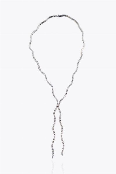 GIROCOLLO : Peso gr 26 7 semirigido  in oro bianco  modello tennis  composto da segmenti mossi  con diamanti taglio brillante per totali ct 3 0 ca  - Asta Asta 205 Gioielli - Associazione Nazionale - Case d'Asta italiane