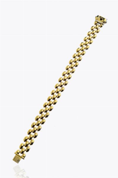 CHIMENTO : Peso gr 21 4 Lunghezza cm 18 Bracciale in oro giallo e bianco  firmato Chimento  lavorato a maglia geometrica Il bracciale  double face: presenta un lato in oro giallo ed un lato in oro bianco  - Asta Asta 205 Gioielli - Associazione Nazionale - Case d'Asta italiane