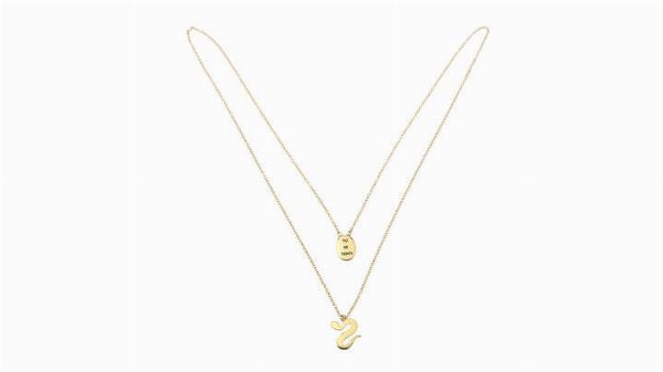 POMELLATO : Peso gr 6 8 Ciondolo in oro giallo firmato Pomellato  linea Dodo  con catena in oro giallo non firmata.  - Asta Asta 205 Gioielli - Associazione Nazionale - Case d'Asta italiane