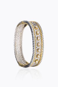 BRACCIALE - Peso gr 36 2 rigido  in oro giallo e bianco  interamente lavorato a pizzo con diamanti taglio brillante e 8/8  [..]