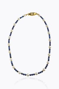 GIROCOLLO - Peso gr 25 1 Lunghezza cm 43 composto da sfere di iolite del diam di mm  alternate a perle giapponesi del diam.  [..]