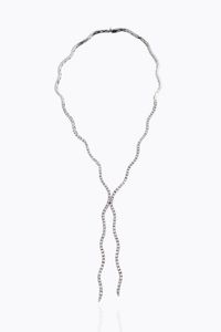 GIROCOLLO - Peso gr 26 7 semirigido  in oro bianco  modello tennis  composto da segmenti mossi  con diamanti taglio brillante  [..]