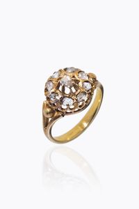 ANELLO - Peso gr 3 6 Misura 10 (50) in oro giallo a bassa caratura  XIX secolo  con sommit circolare con rosette di diamanti  [..]