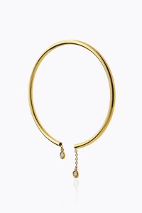 BRACCIALE - Peso gr 6 0 rigido  in oro giallo  con terminali recanti due diamanti tremblant per totali ct 0 12 ca