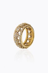 ETERNEL - Peso gr 11 3 Misura 16 (56) in oro giallo  con fiori e file in diamanti taglio brillante per totali ct 1 0 ca