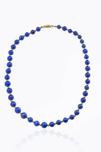 GIROCOLLO - Lunghezza cm 49 composto da un filo di sfere di lapislazzuli del diam di mm 10. Chiusura e distanziali in oro  [..]