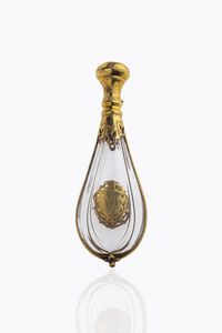 PORTAPROFUMO - Cm 10x3 in cristallo con decoro e tappo in oro giallo. Turchese cabochon a decoro. Fine XVIII inizi XIX secolo