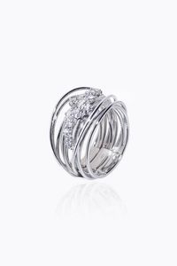 ANELLO - Peso gr 9 0 Misura 12 (52) in oro bianco  sommit lavorata a fili intrecciati con diamanti taglio brillante per  [..]
