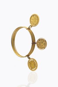 BRACCIALE - Peso gr 62 1 rigido composto da sette anelli raccordati tra loro e recanti tre monete: 10 Gulden  20 Franchi   [..]