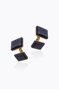 COPPIA DI GEMELLI - Peso gr 7 8 in oro rosa ed onice inciso con volto virile