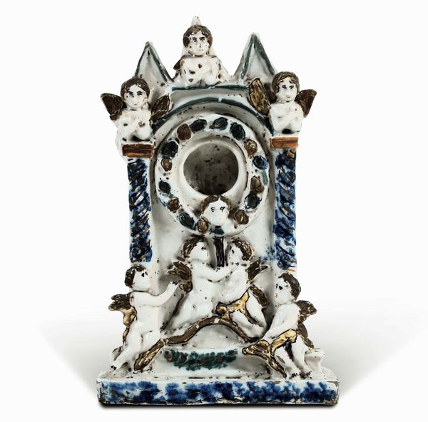 Raro porta orologio<BR>Italia meridionale, probabilmente Campania o Puglia, fine del XVIII o inizio del XIX secolo<BR>  - Asta Maioliche e Porcellane - Associazione Nazionale - Case d'Asta italiane