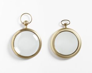 FORNASETTI PIERO (1913 - 1988) - nello stile di. Coppia di specchi