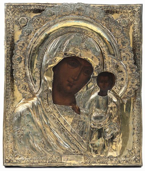 Icona su tavola. Riza in argento sbalzato, cesellato e dorato. Mosca 1832. Assaggiatore Nikolay Dubrovin. Argentiere non identificato Vergine di Kazan  - Asta Argenti antichi  - Associazione Nazionale - Case d'Asta italiane