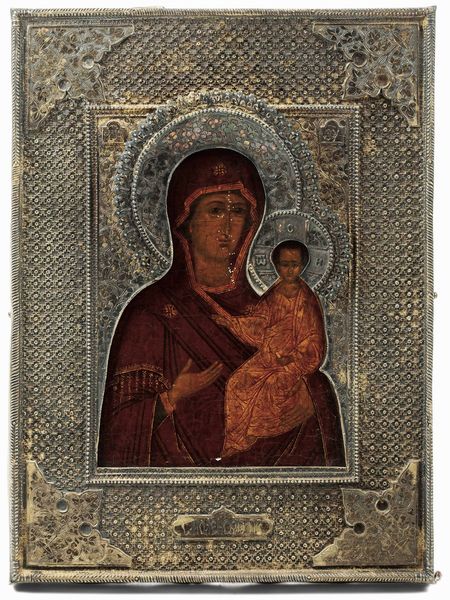 Madonna con Bambino. Icona su tavola. Probabile XVII secolo. Riza in argento sbalzato e cesellato. Mosca 1870. assaggiatore A.Svechin  - Asta Argenti antichi  - Associazione Nazionale - Case d'Asta italiane