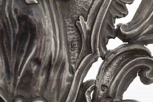 Acquasantiera con raffigurazione di San Luigi Gonzaga. Argento sbalzato, traforato e cesellato. Genova, bollo della Torretta per lanno (1)762  - Asta Argenti antichi  - Associazione Nazionale - Case d'Asta italiane