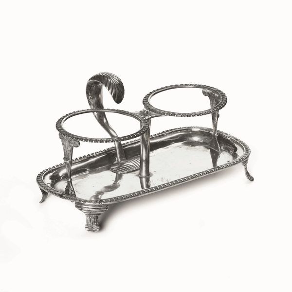 Porta ampolle. Argento fuso, sbalzato e cesellato. Sanpietroburgo XIX secolo  - Asta Argenti antichi  - Associazione Nazionale - Case d'Asta italiane