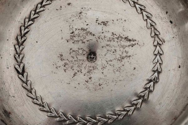 Sei sottobicchieri e un sottobottiglia. Argento sbalzato, traforato e cesellato. Novara primo quarto del XIX secolo. Argentiere Pasquale Scavini  - Asta Argenti del XX secolo - Associazione Nazionale - Case d'Asta italiane