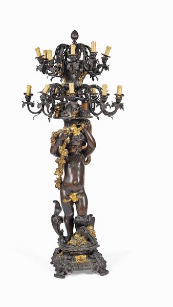 Grande candelabro in bronzo patinato. XX secolo  - Asta Dimore italiane  - Associazione Nazionale - Case d'Asta italiane