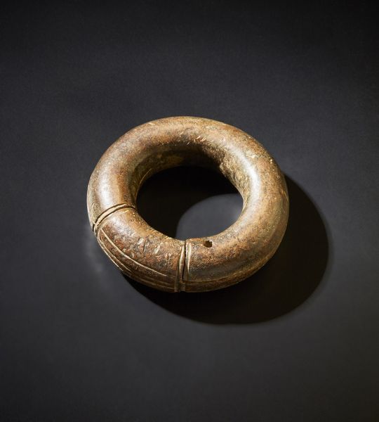 Arte africana : Bracciale moneta.Bronzo.Segni d'uso.  - Asta Asta 365 | ARTE AFRICANA, OCEANICA E DELLE AMERICHE - ARTE AFRICANA Tradizionale - Associazione Nazionale - Case d'Asta italiane
