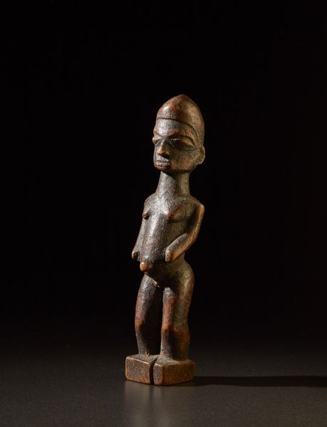 Lobi - Burkina Faso : Figura maschile o Bateba.Legno duro a patina scura.Segni d'uso.  - Asta Asta 365 | ARTE AFRICANA, OCEANICA E DELLE AMERICHE - ARTE AFRICANA Tradizionale - Associazione Nazionale - Case d'Asta italiane