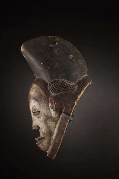 Punu - Gabon, Regione del fiume Ngouni : Maschera Mukudj.Legno tenero a patina naturale, caolino e pigmenti.Mancanze e segni d'uso.  - Asta Asta 365 | ARTE AFRICANA, OCEANICA E DELLE AMERICHE - ARTE AFRICANA Tradizionale - Associazione Nazionale - Case d'Asta italiane