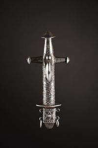 Tuareg - Sahara - Frammento di sella.Ferro, legno, argento e tessuto.Segni d'uso.