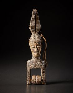 Guro - Costa d'Avorio - Puleggia da telaio.Legno duro con patina scura.Segni d'uso.