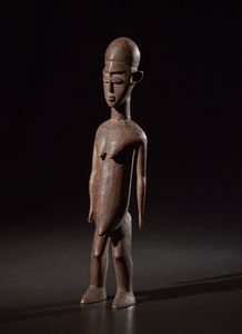 Lobi - Burkina Faso - Figura maschile o Bateba.Legno duro a patina naturale.Segni d'uso.