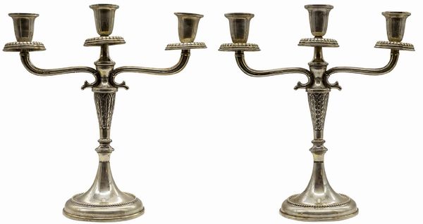 Coppia di candelabri  - Asta Asta 102 - Gioielli, Orologi e Argenti - Associazione Nazionale - Case d'Asta italiane