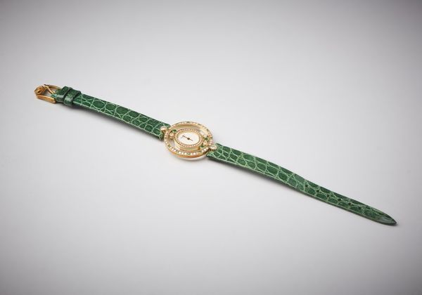 CHOPARD : Orologio da donna in oro giallo 750/1000  modello Happy Diamonds  con diamanti e smeraldi di eccezionale qualit� e purezza.  - Asta Asta 366 | GIOIELLI - OROLOGI - Giunonicae Online - Associazione Nazionale - Case d'Asta italiane