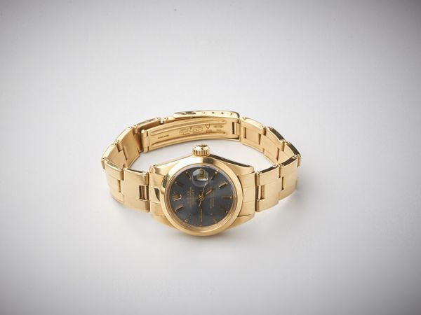 ROLEX : Orologio da donna  modello Datejust in oro giallo 750/1000 con quadrante  colore grigio ardesia. Misura mm 26  - Asta Asta 366 | GIOIELLI - OROLOGI - Giunonicae Online - Associazione Nazionale - Case d'Asta italiane