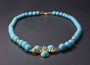 Una parure  collana orecchini ed anello con sfere di turchesi ed oro giallo 750/1000 .  - Asta Asta 366 | GIOIELLI - OROLOGI - Giunonicae Online - Associazione Nazionale - Case d'Asta italiane