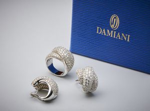 DAMIANI : Una parure composta da anello in oro bianco 750/1000 e orecchini  della serie''Gomitolo''.  - Asta Asta 366 | GIOIELLI - OROLOGI - Giunonicae Online - Associazione Nazionale - Case d'Asta italiane