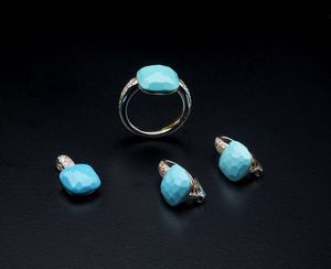 POMELLATO - Parure  composta da anello,orecchini e  ciondolo in oro bianco 750/1000 con diamanti taglio brillante ct. 0,40 circa e crisoprasi. Collezione ''Capri''.