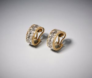 BUCCELLATI Federico (1891 - 1965) : Anello e paio di orecchini in oro bianco e giallo 750/1000 con diamante centrale taglio a brillante di circa 0,30 carati  e contorno di  piccoli diamanti bianchi taglio huit huit.  - Asta Asta 366 | GIOIELLI - OROLOGI - Giunonicae Online - Associazione Nazionale - Case d'Asta italiane