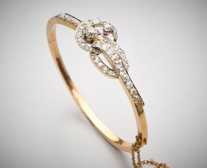 . : Bracciale rigido a manetta in oro giallo 750/1000 con diamanti taglio antico di circa 3,50 ct.  - Asta Asta 366 | GIOIELLI - OROLOGI - Giunonicae Online - Associazione Nazionale - Case d'Asta italiane