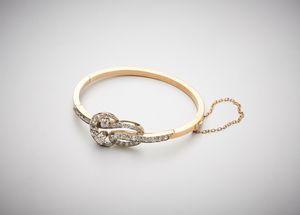 . : Bracciale rigido a manetta in oro giallo 750/1000 con diamanti taglio antico di circa 3,50 ct.  - Asta Asta 366 | GIOIELLI - OROLOGI - Giunonicae Online - Associazione Nazionale - Case d'Asta italiane