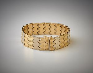 . - Bracciale semirigido  con segmenti geometrici in oro bianco giallo e rosa 750/1000