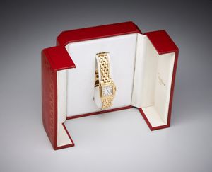 CARTIER - Orologio Santos in oro giallo 750/1000, movimento al quarzo, maglie mancanti.