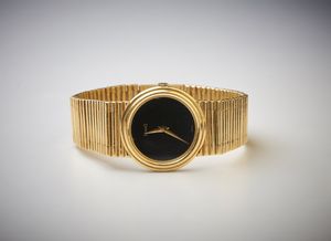 Piaget - Orologio da donna ultra slim con  cassa tonda, quadrante nero in oro giallo 750/1000, modello 904.