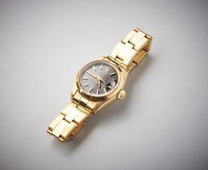 ROLEX - Orologio da donna  modello Datejust in oro giallo 750/1000 con quadrante  colore grigio ardesia. Misura mm 26