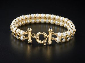 . : Bracciale di perle coltivate bianche 5.20 mm con struttura in oro giallo 750/1000 e piccoli zaffiri blu taglio cabochon.  - Asta Asta 366 | GIOIELLI - OROLOGI - Giunonicae Online - Associazione Nazionale - Case d'Asta italiane
