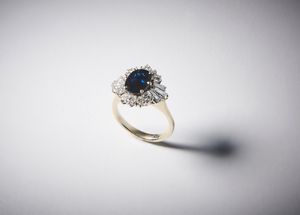 . - Anello oro bianco 750/1000 con  zaffiro blu ct.2,20 circa e diamanti bianchi taglio misto ct. 1.10 circa.