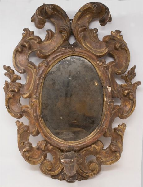 Specchiera ovata in legno intagliato e dorato  - Asta Parade I - Arredi e Dipinti Antichi - Associazione Nazionale - Case d'Asta italiane