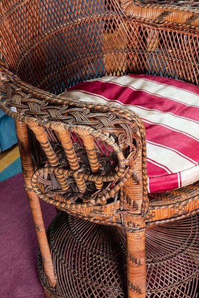 Poltrona Pavone in rattan. XX secolo  - Asta ECLECTICA, the home of designer Nicol� Castellini Baldissera - Associazione Nazionale - Case d'Asta italiane