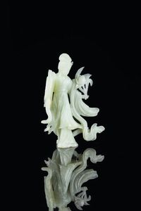 SCULTURA IN GIADEITE - Scultura in Giadeite rappresentante Guanyin  Cina  XX secolo. h cm 20x14