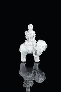 GUANYIN - Blanc de Chine rappresentante Guanyin su elefante  Cina  dinstia Qing  XIX secolo. h cm 22x15 5